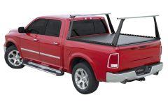 Red pickup truck with black tonneau cover and silver accents.