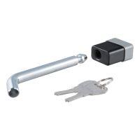 Silver L-shaped tool, black and silver box, and keys.