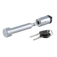 Disassembled silver tubular lock with keys.