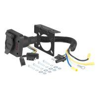 Trailer wiring harness kit with 6-way plug and mounting bracket.
