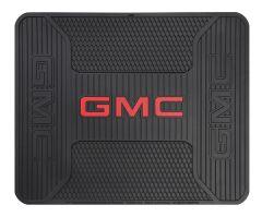 Black rubber vehicle floor mat with a red "GMC" logo and textured surface.