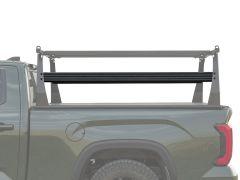 Truck bed rack on green pickup truck.