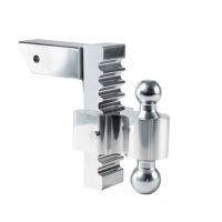 Shiny metal trailer hitch with dual balls.