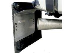 Close-up of a vehicle's exhaust system featuring a metallic tailpipe and a warning plate marked "HOT."