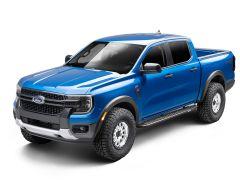 A blue Ford pickup truck with a rugged design, large tires, and alloy wheels seen at a slight angle to highlight its front and side profile.