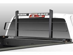 Truck bed with black BackRack headache rack.