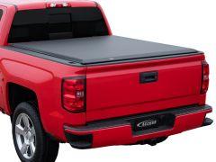Red pickup truck with black tonneau cover.