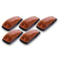 Five orange automotive marker lights with black bases arranged in a staggered layout.