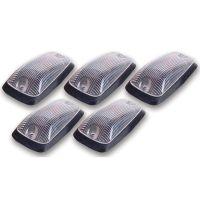 Five identical automotive light covers with curved, ridged tops and black bases, arranged in a staggered layout.