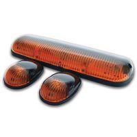 Three vehicle lights: one long rectangular light bar and two smaller oval lights, all in orange and black.