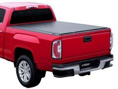 Red pickup truck with black tonneau cover.