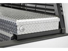 Diamond plate steel truck bed storage box with lock.