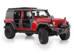 Red Jeep Wrangler with removed front doors and rugged tires displayed against a white background.
