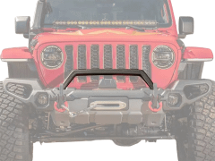Detailed image of a red Jeep's front bumper with a black bumper, emphasizing its bold and robust appearance.