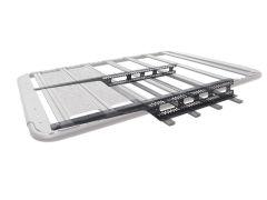 A rectangular metal rack featuring parallel rods and a dark perforated central support, framed in white metal.