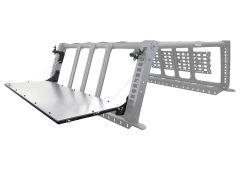 Metal mounted table extending at an angle, featuring adjustable components for support.