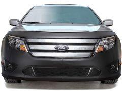 Black Ford car front view with silver grill.