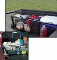 Truck bed organizer with storage bins and gear.