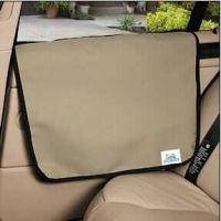 Beige car seat cover with black trim and seatbelt.