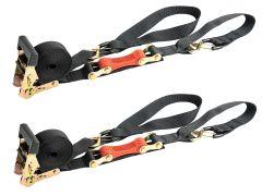 Two black ratchet straps with metallic gold mechanisms and red grips, side by side.