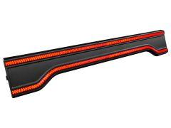 Black automotive rear light assembly with red LED lights in a wave-like pattern.