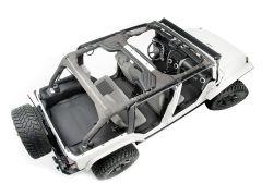 Overhead view of a white open-top Jeep with prominent roll cage and large off-road tires.