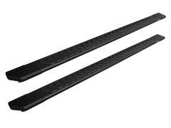 Black, rectangular vehicle running boards with textured, chevron patterns for grip. Positioned diagonally and parallel against a white background.