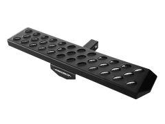 Black truck hitch step with a rectangular shape featuring a grid of circular holes. It has a matte finish and appears durable for vehicle use.