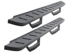 Two black vehicle running boards with slotted surfaces and handles, placed parallel to each other.