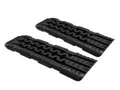 Two black recovery boards with spikes for traction.
