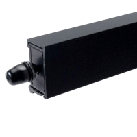 Close-up of a rectangular black metal or plastic object with a rounded end and a small protrusion.