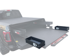 Black truck bed with storage boxes extended.