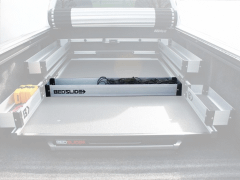 Truck bed with installed Bed Slide storage system.