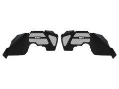 Pair of black steel fender liners with angular design and mesh sections displaying the text "WESTIN."