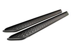 The image displays two identical black side steps laid parallel to each other. These side steps are designed for vehicle entry assistance and feature a sleek elongated shape with rounded edges. Each step has a series of evenly spaced, triangular cutouts r